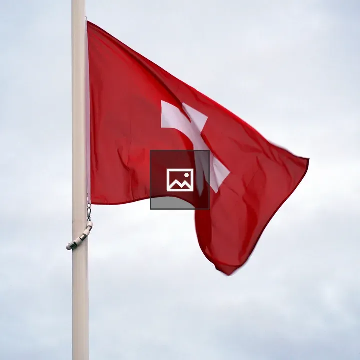 Swiss flag on flagpole