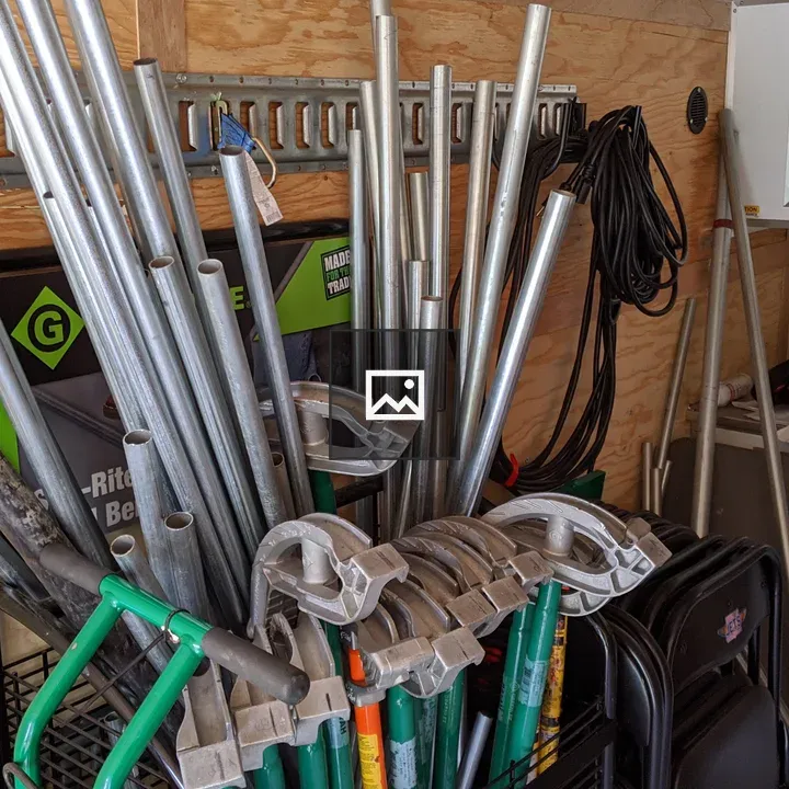 Conduit and hand benders in rack
