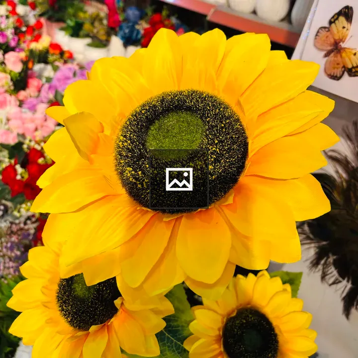Bright yellow artificial sunflowers