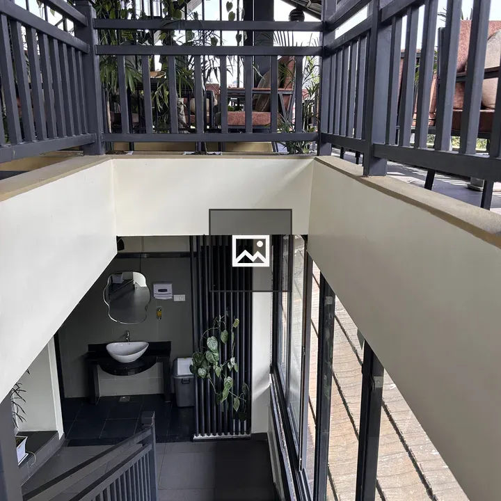 Staircase with dark stone steps