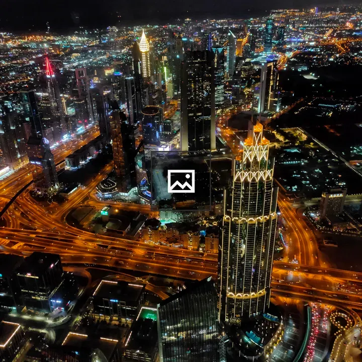 Glimmering Dubai Night View from 124th Floor
