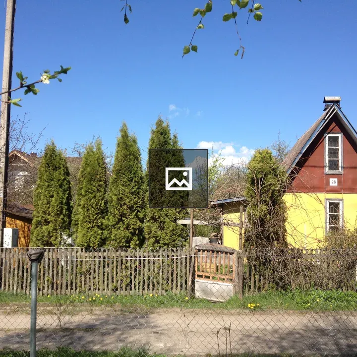 Yellow house with red roof