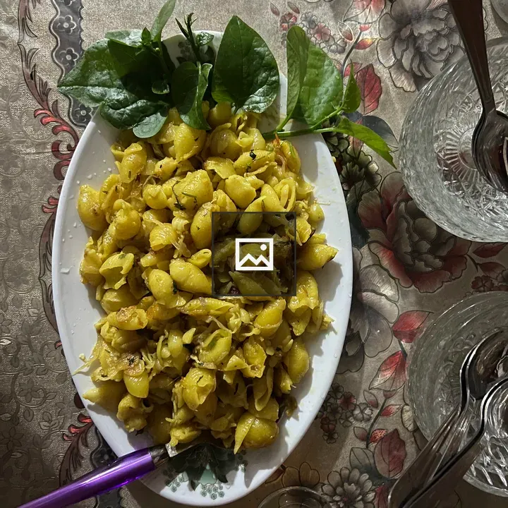 Plate of Pasta and Spoons