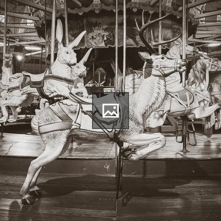 Antique carousel with wooden reindeer