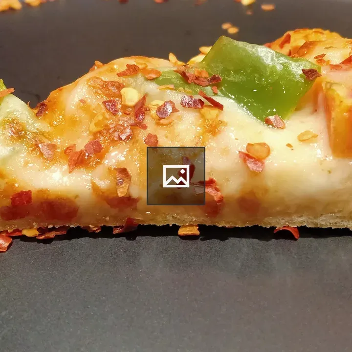 Pizza dish on gray and yellow