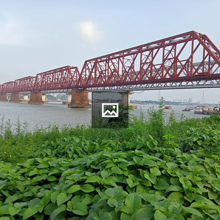 Red Bridge Over River in Bangladesh