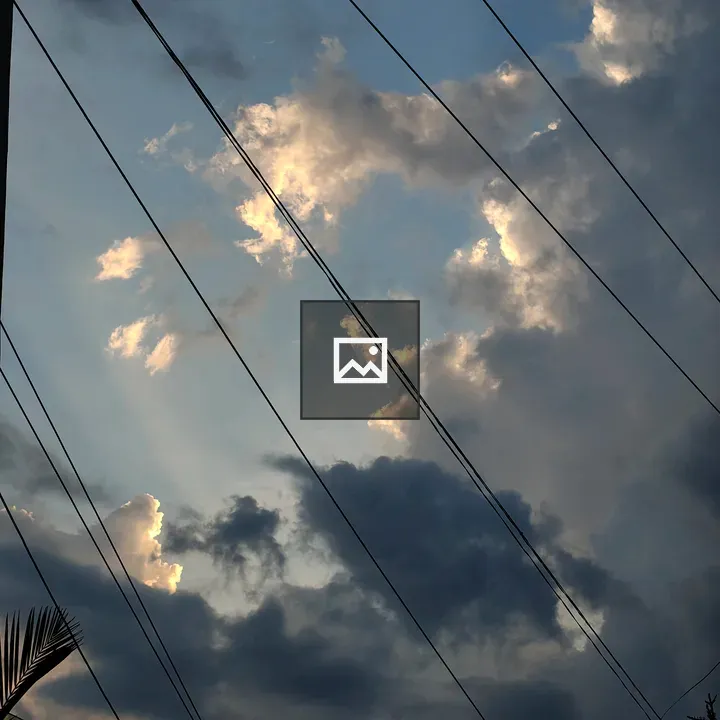 Dramatic Sky Over Blue Horizon