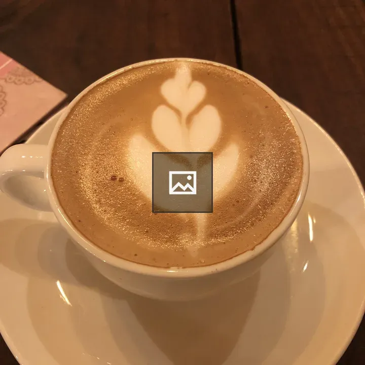 Cup of cappuccino with latte art