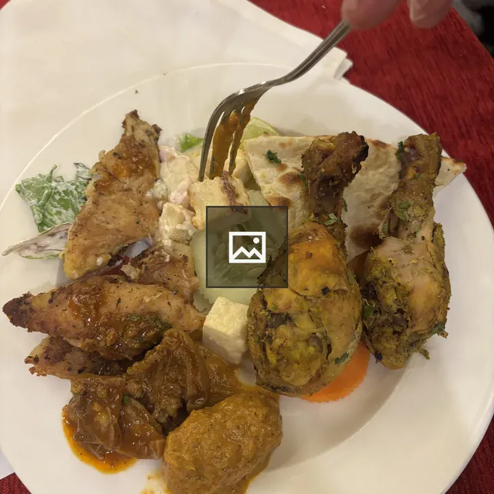 Plate of assorted grilled foods