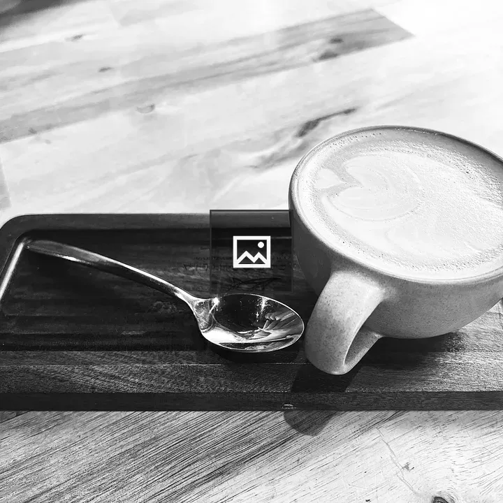 Black and white cappuccino on tray