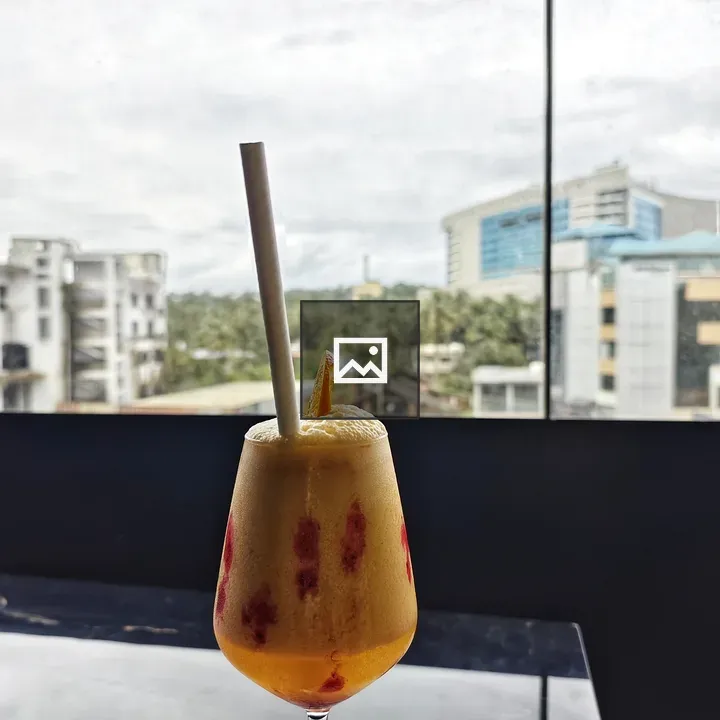 Colorful juice in tall glass