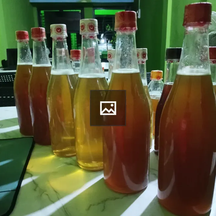 Honey bottles in office room