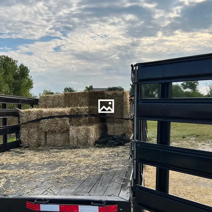 Long bed truck at straw yard