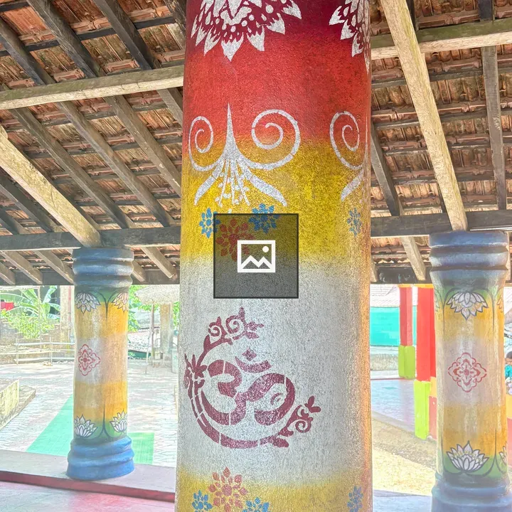 Painted pillar with Om symbol