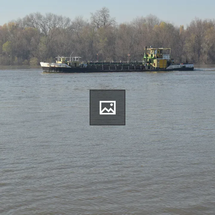 Small commercial boat on river