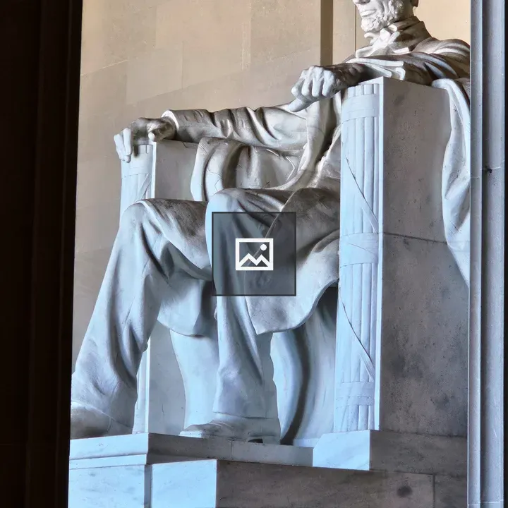 Abraham Lincoln Statue Through Lincoln Memorial Pillars