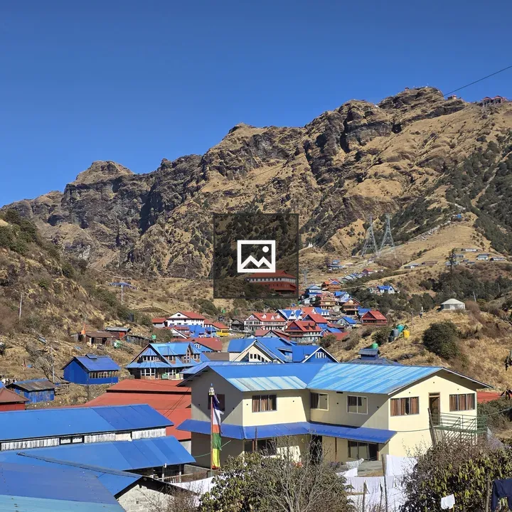 Mountain village rooftops and mountains