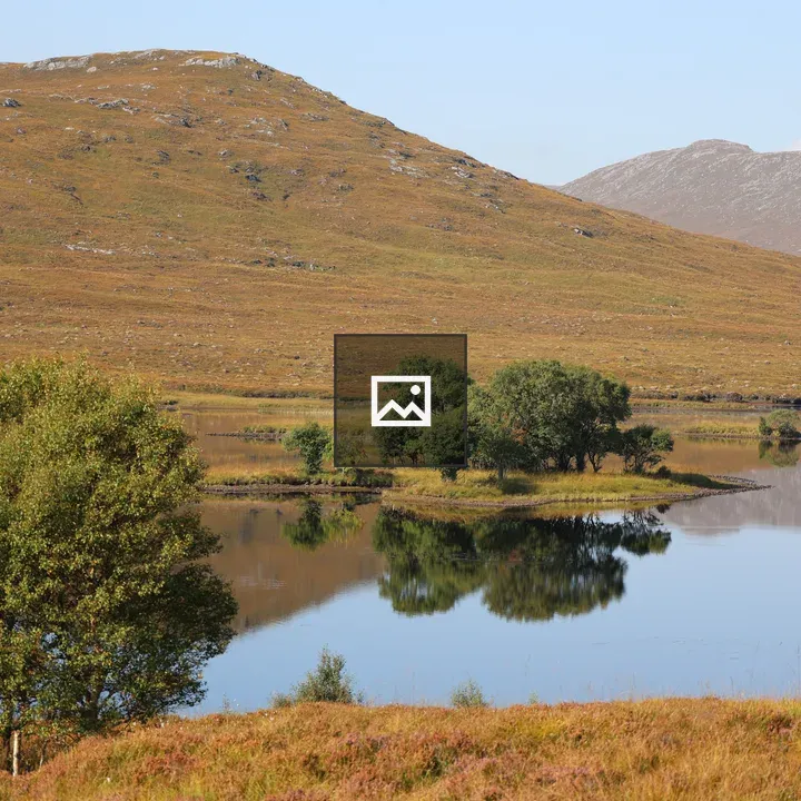 Autumn reflections on a Scottish loch