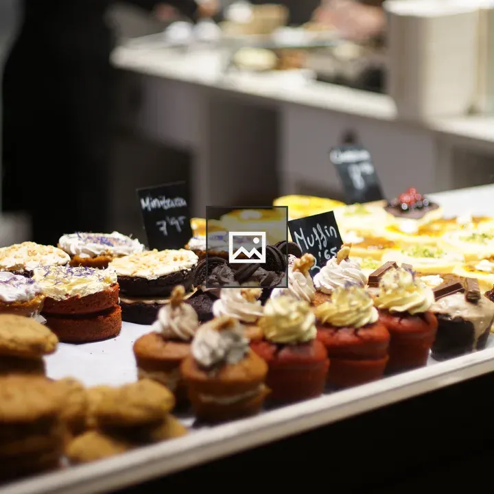 Muffins and pastries through shop window