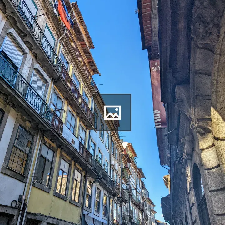 Narrow street with colorful facades