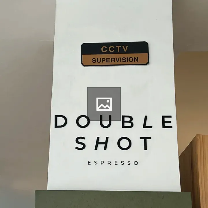 Double Shot Espresso Sign on Wall