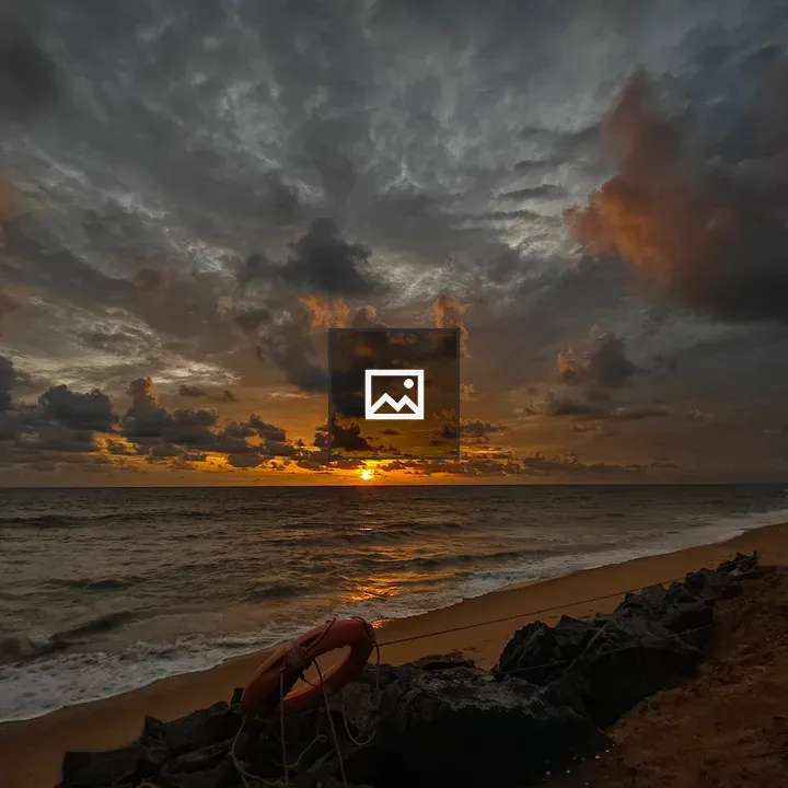 Sunset Over Ocean with Lifebuoy