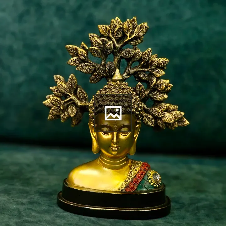 Buddha statue with decorative tree design