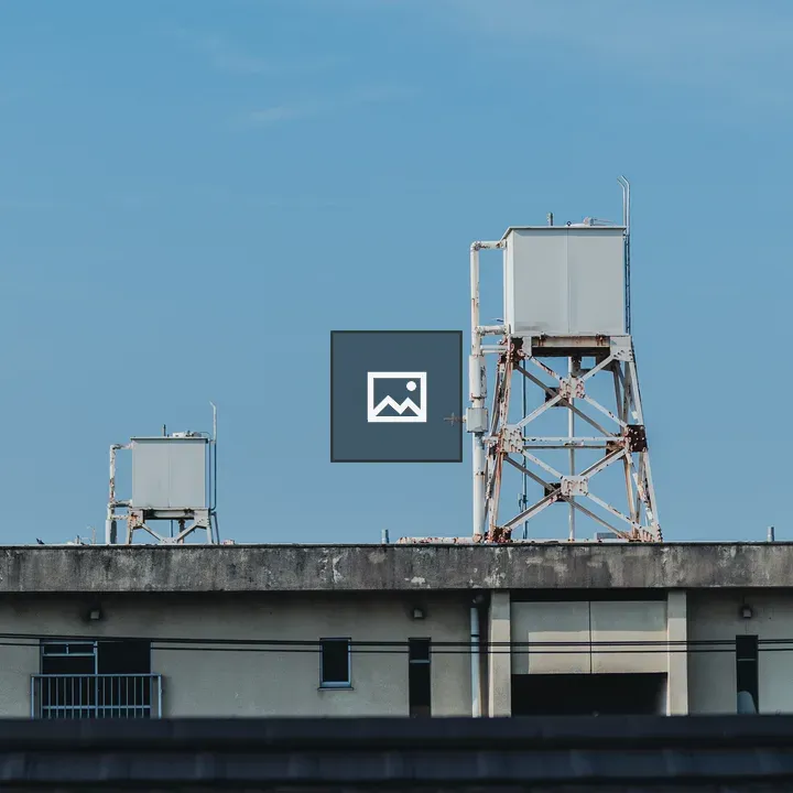 Water tanks atop aged building