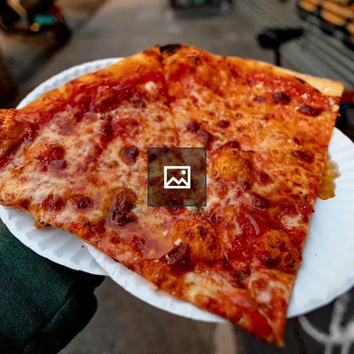 Two plain slices of New York Pizza