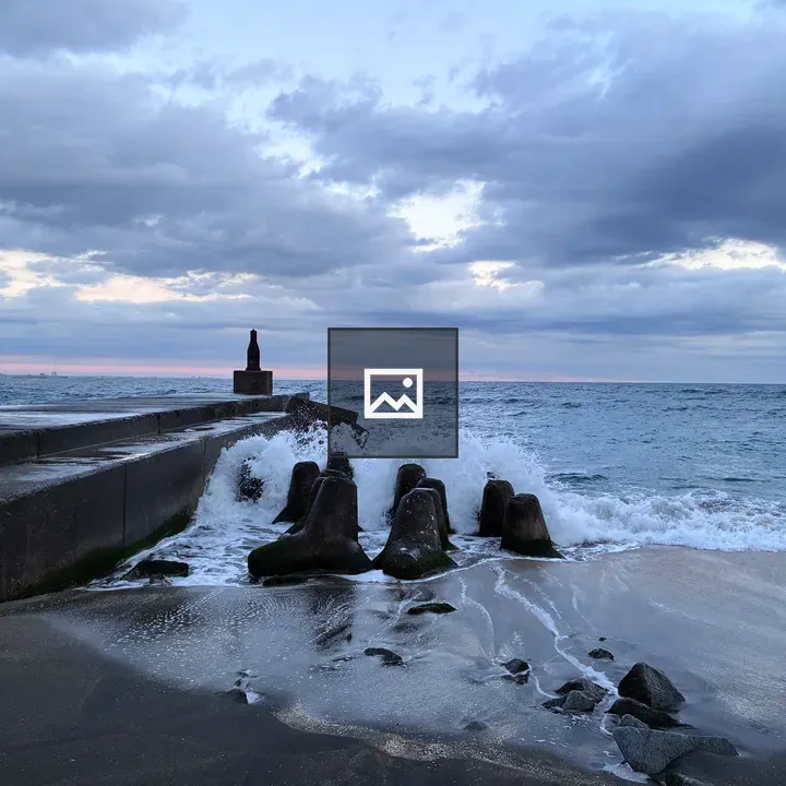 Rocky shoreline with jetty