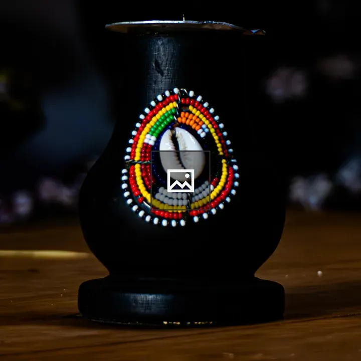 Small carved black container