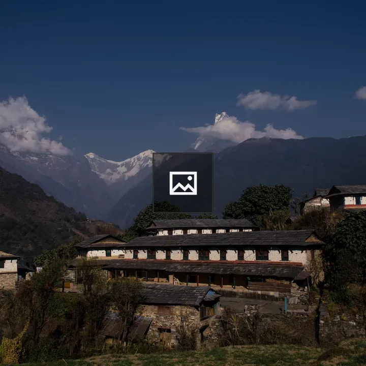 Mountain village with snow peaks