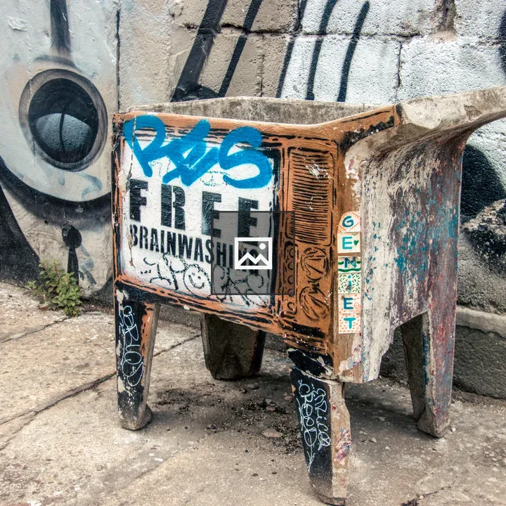 Old wash basin with propaganda