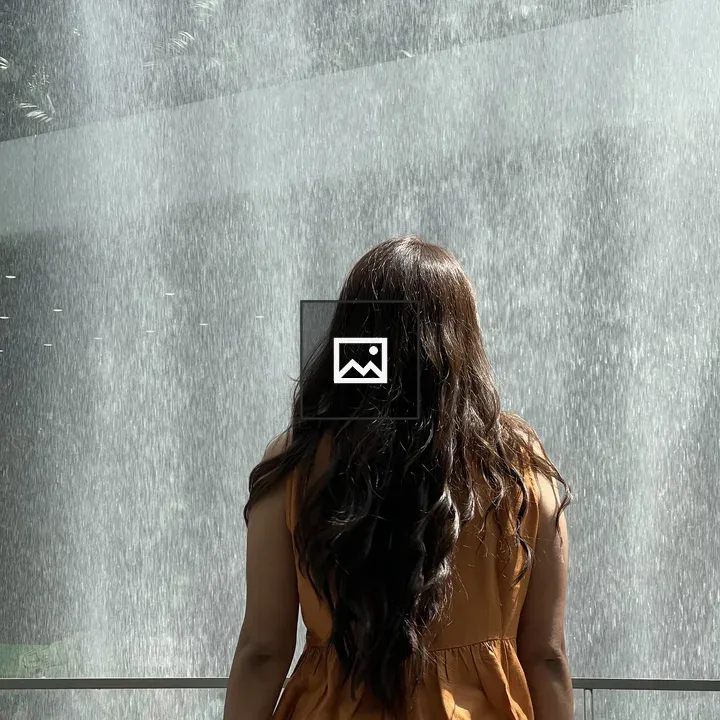Person by waterfall