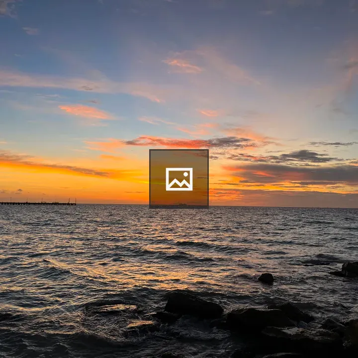 Sunrise over Cancun Waters