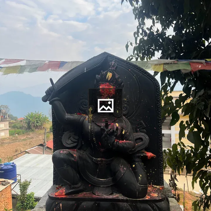Manjushri statue on wall