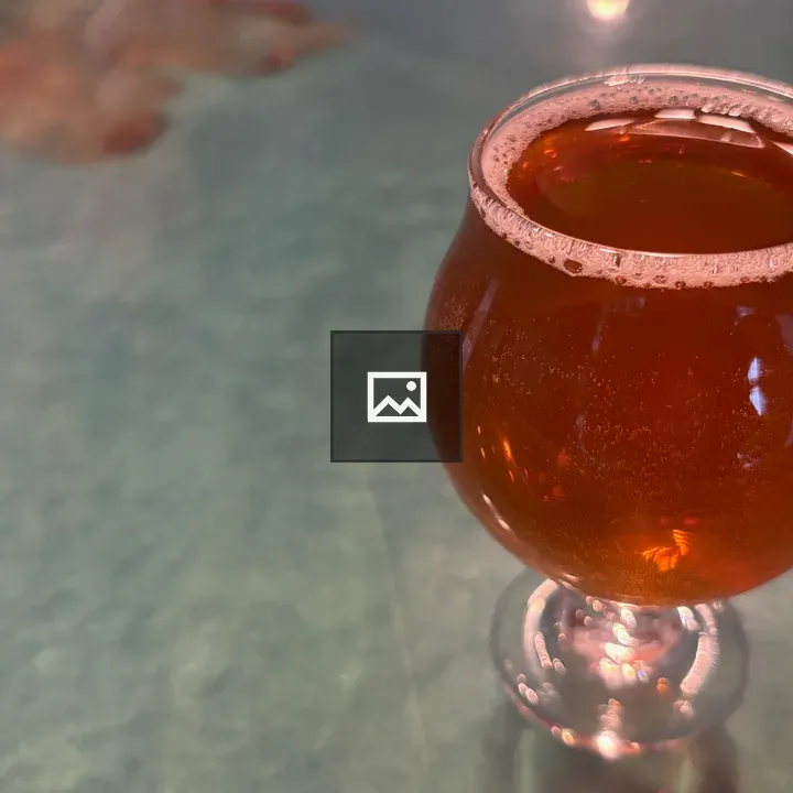 Dark mead in tulip glass