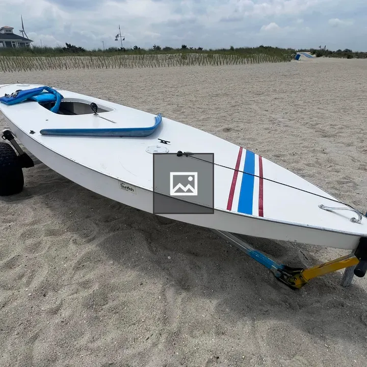 Single Sunfish Sailboat on Trailer