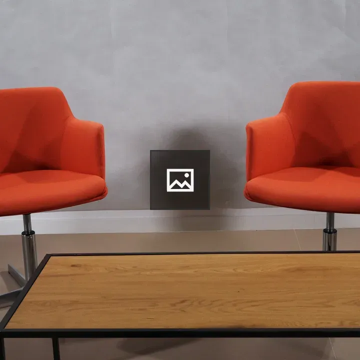 Television interview set with orange couches