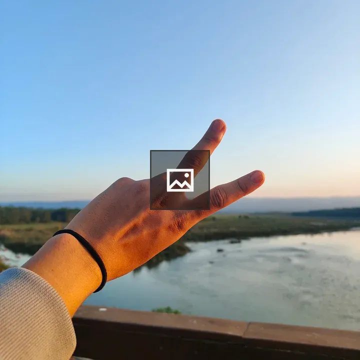 Hand Peace Sign in Landscape
