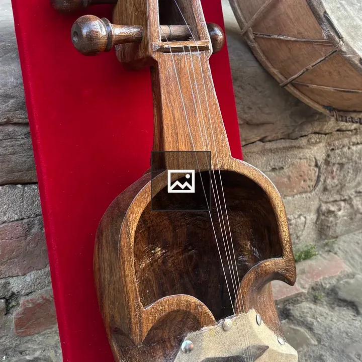 Sarangi on Red Background