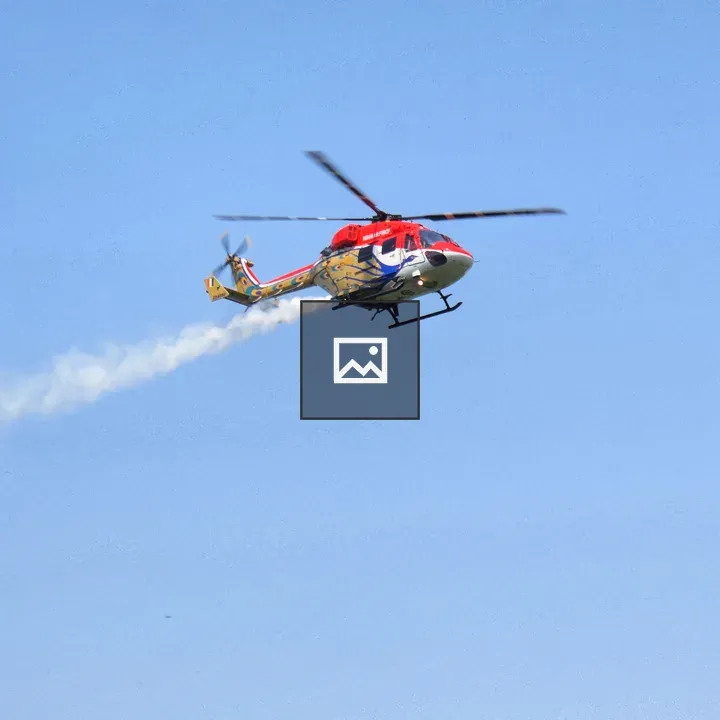 Helicopter in blue sky