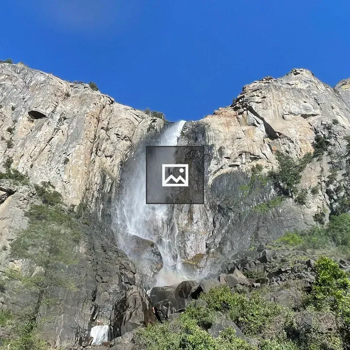 Waterfall in lush canyon