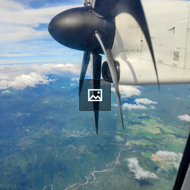 Airplane Window View with Propeller