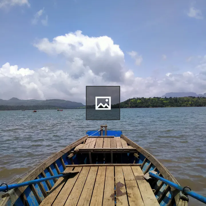 Wooden boat on calm lake