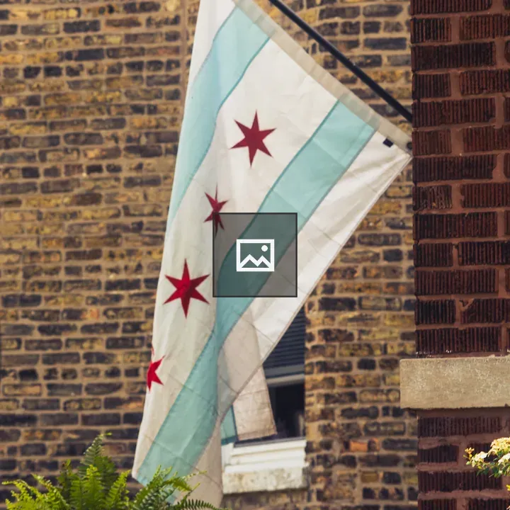 Chicago flag on brick building