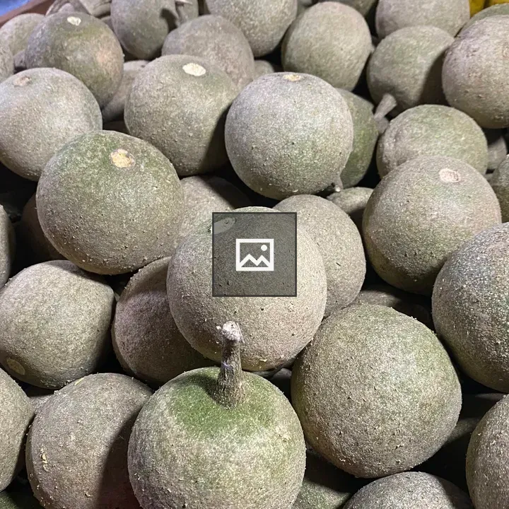 Close-up of greenish-brown fruit pile