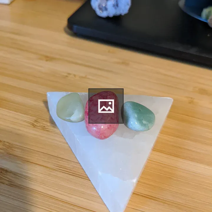 Three rocks on a quartz triangle