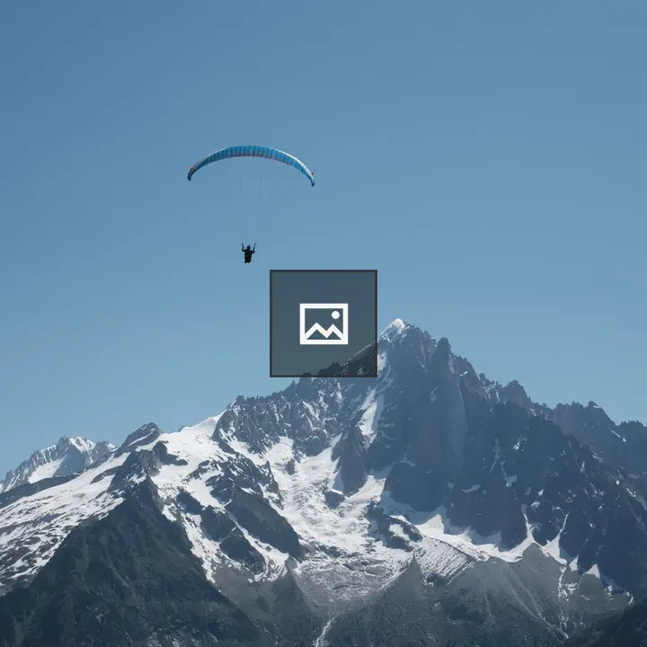 Paragliding over mountains