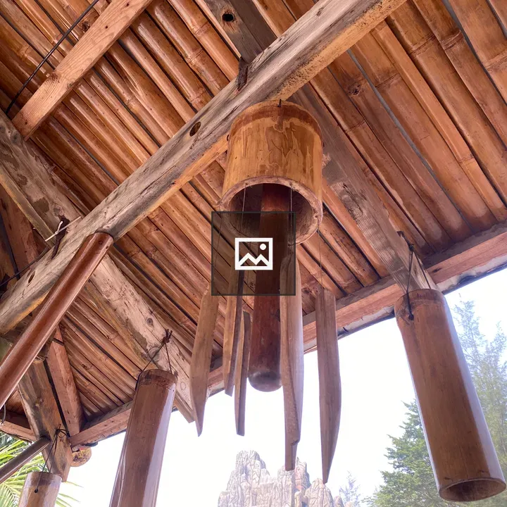 Wooden ceiling with bamboo wind chimes